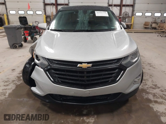 2018 Chevrolet Equinox LT z VIN 2GNAXSEV6J6198809, wystawiony jako IAAI lot #41945758 z przebiegiem 196 485 mil mil oraz . Historia ofert i sprzedaży dostępna na DreamBid. Obrazek 13.