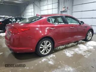 2013 Kia Optima EX z VIN 5XXGN4A70DG226773, wystawiony jako Copart lot #83885634 z przebiegiem 138 772 mil mil oraz Czysty tytuł • Clean title. Historia ofert i sprzedaży dostępna na DreamBid. Obrazek 3.