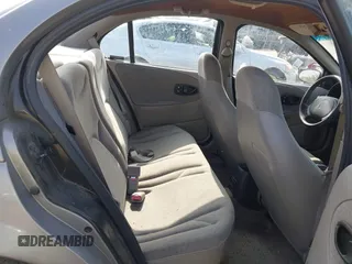 1999 Saturn SL z VIN 1G8ZH5280XZ249494, wystawiony jako IAAI lot #42347493 z przebiegiem 106 491 mil mil oraz . Historia ofert i sprzedaży dostępna na DreamBid. Obrazek 8.