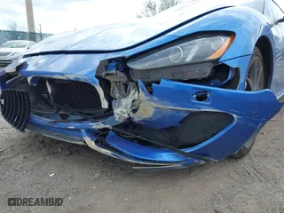 2013 Maserati GranTurismo Sport with VIN ZAM45VLA7D0073503, listed as a IAAI auction lot 41921102 with 53,436 mi miles. Bid and sale history available at carsss.com. Image 6.