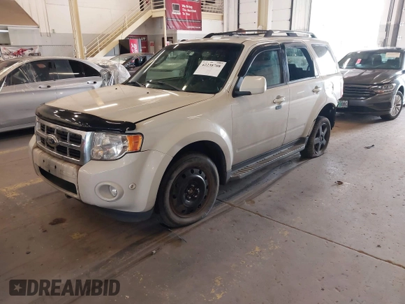2012 Ford Escape Limited z VIN 1FMCU9EG7CKB32270, wystawiony jako IAAI lot #42238708 z przebiegiem 102 348 mil mil oraz . Historia ofert i sprzedaży dostępna na DreamBid. Obrazek 2.