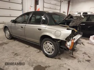 1997 Saturn SL with VIN 1G8ZH5280VZ172929, listed as a IAAI auction lot 41273214 with 134,972 mi miles. Bid and sale history available at carsss.com. Image 3.