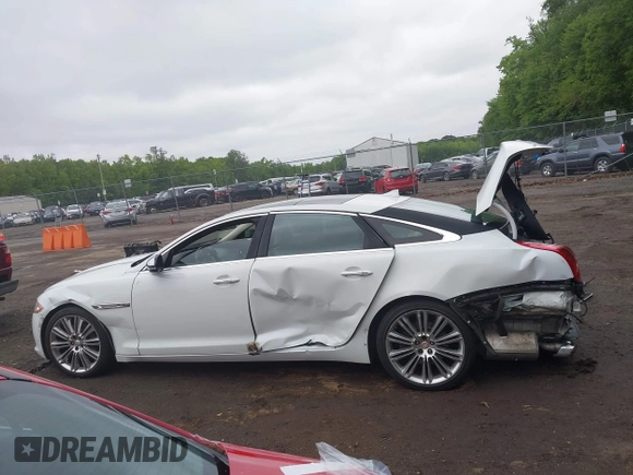 2015 Jaguar XJ Portfolio с VIN SAJWJ2GD2F8V90256, выставлен на аукционе IAAI как лот 42311335 с пробегом 123 299 миль миль и . История ставок и продаж доступна на DreamBid. Изображение 13.
