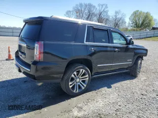 2015 GMC Yukon Denali with VIN 1GKS2CKJ5FR612147, listed as a Copart auction lot 49209525 with 127,262 mi miles and Salvage Title. Bid and sale history available at carsss.com. Image 3.