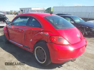 2012 Volkswagen Beetle 2.5L w/Sound/Nav PZEV with VIN 3VWJP7AT6CM620285, listed as a IAAI auction lot 42094101 with 125,737 mi miles and . Bid and sale history available at DreamBid. Image 3.