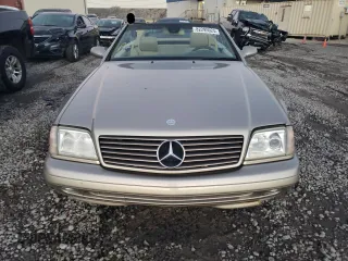 1999 Mercedes-Benz SL-Class with VIN WDBFA68F8XF178084, listed as a Copart auction lot 82295024 with 123,008 mi miles and Salvage Title. Bid and sale history available at carsss.com. Image 5.