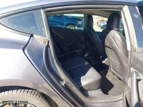 2022 Tesla Model 3 Long Range with VIN 5YJ3E1EB9NF197127, listed as a IAAI auction lot 41366323 with 56,559 mi miles. Bid and sale history available at carsss.com. Image 8.
