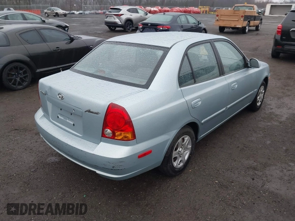 2003 Hyundai Accent GL with VIN KMHCG45C33U473080, listed as a IAAI auction lot 41868765 with 57,478 mi miles. Bid and sale history available at carsss.com. Image 4.
