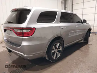 2014 Dodge Durango R/T with VIN 1C4SDJCTXEC558937, listed as a IAAI auction lot 41570244 with 174,724 mi miles and . Bid and sale history available at DreamBid. Image 4.