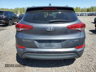 2018 Hyundai Tucson SEL with VIN KM8J3CA41JU784239, listed as a Copart auction lot 54331525 with 63,121 mi miles and Salvage title. Bid and sale history available at DreamBid. Image 6.