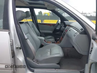 1999 Mercedes-Benz E-Class with VIN WDBJH65F5XA721205, listed as a IAAI auction lot 42068204 with 183,421 mi miles. Bid and sale history available at carsss.com. Image 5.