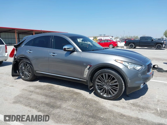 2015 Infiniti QX70 with VIN JN8CS1MW1FM481233, listed as a IAAI auction lot 41976458 with 134,875 mi miles and . Bid and sale history available at DreamBid. Image 13.