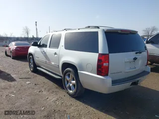 2011 Chevrolet Suburban LTZ with VIN 1GNSCKE02BR317269, listed as a IAAI auction lot 41446893 with 304,318 mi miles. Bid and sale history available at carsss.com. Image 14.