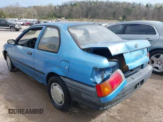 1992 Toyota Tercel z VIN JT2EL46B0N0239559, wystawiony jako IAAI lot #41890594 z przebiegiem 210 767 mil mil oraz . Historia ofert i sprzedaży dostępna na DreamBid. Obrazek 3.