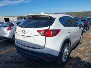 2013 Mazda CX-5 Grand Touring with VIN JM3KE2DE2D0122805, listed as a IAAI auction lot 41201502 with 178,833 mi miles. Bid and sale history available at carsss.com. Image 4.