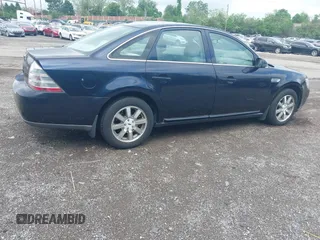 2009 Ford Taurus SEL with VIN 1FAHP24W89G106621, listed as a IAAI auction lot 42209803 with 60,373 mi miles. Bid and sale history available at carsss.com. Image 4.