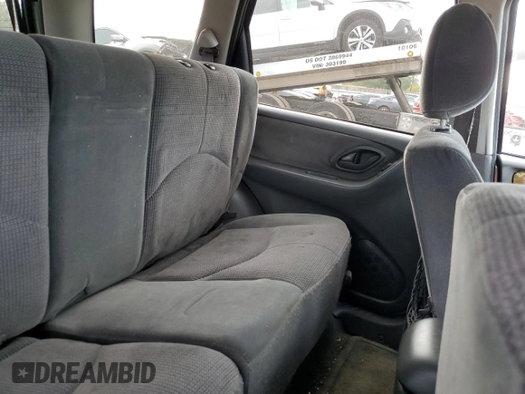 2003 Mazda Tribute LX with VIN 4F2YZ94123KM49852, listed as a Copart auction lot 71779054 with 263,938 mi miles and Salvage Title. Bid and sale history available at carsss.com. Image 11.