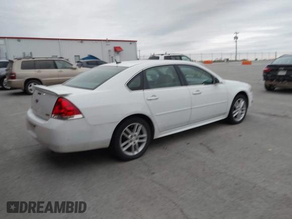 2013 Chevrolet Impala LTZ with VIN 2G1WC5E37D1223897, listed as a IAAI auction lot 41950823 with 165,237 mi miles and . Bid and sale history available at DreamBid. Image 4.