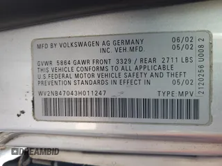 2003 Volkswagen EuroVan MV с VIN WV2NB47043H011247, выставлен на аукционе Copart как лот 85056064 с пробегом 190 282 миль миль и Списание • Salvage title. История ставок и продаж доступна на DreamBid. Изображение 13.