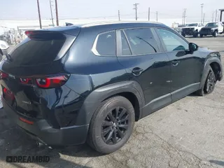 2024 Mazda CX-50 2.5 S Premium Package with VIN 7MMVABDM7RN198538, listed as a IAAI auction lot 41481055 with 54,921 mi miles. Bid and sale history available at carsss.com. Image 4.