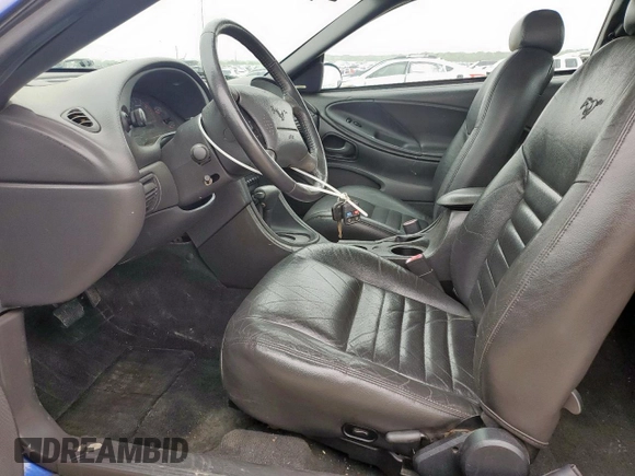 2004 Ford Mustang GT Deluxe z VIN 1FAFP42X74F232580, wystawiony jako Copart lot #55434075 z przebiegiem 83 948 mil mil oraz Szkoda całkowita • Salvage title. Historia ofert i sprzedaży dostępna na DreamBid. Obrazek 7.