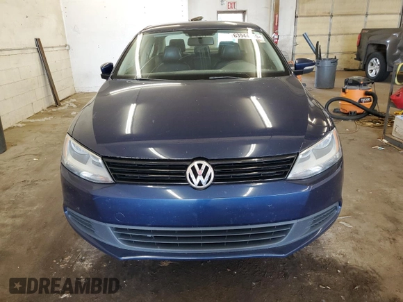 2014 Volkswagen Jetta SE with VIN 3VWD17AJ7EM428230, listed as a Copart auction lot 63944345 with 166,370 mi miles and Clean title. Bid and sale history available at DreamBid. Image 5.