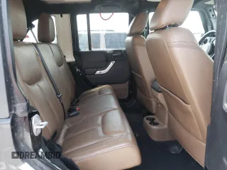 2014 Jeep Wrangler Unlimited Rubicon with VIN 1C4BJWFGXEL291187, listed as a Copart auction lot 54897675 with 227,478 mi miles and Salvage title. Bid and sale history available at DreamBid. Image 11.