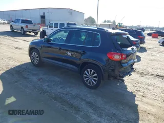2011 Volkswagen Tiguan SE with VIN WVGBV7AX1BW502770, listed as a IAAI auction lot 41739698 with 160,556 mi miles and . Bid and sale history available at DreamBid. Image 3.