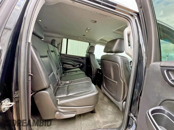 2015 Chevrolet Suburban LT with VIN 1GNSKJKC3FR153922, listed as a Copart auction lot 64337945 with 238,441 mi miles and Clean title. Bid and sale history available at DreamBid. Image 6.