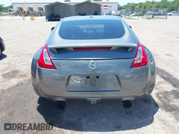2013 Nissan 370Z Touring z VIN JN1AZ4EH2DM384011, wystawiony jako IAAI lot #42274166 z przebiegiem 87 499 mil mil oraz . Historia ofert i sprzedaży dostępna na DreamBid. Obrazek 16.