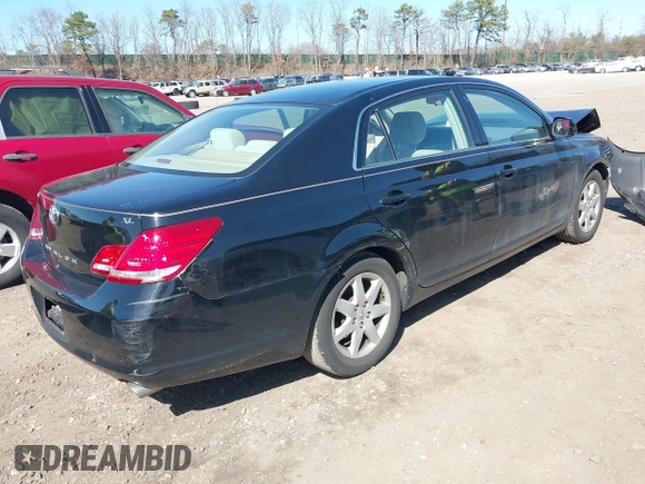2005 Toyota Avalon XL with VIN 4T1BK36B95U048332, listed as a IAAI auction lot 41977547 with 61,293 mi miles and . Bid and sale history available at carsss.com. Image 4.