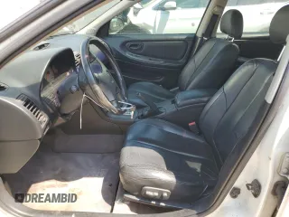 2000 Nissan Maxima GXE z VIN JN1CA31D3YT537410, wystawiony jako Copart lot #68046964 z przebiegiem 313 180 mil mil oraz Czysty tytuł • Clean title. Historia ofert i sprzedaży dostępna na DreamBid. Obrazek 7.