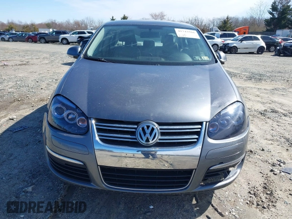 2006 Volkswagen Jetta Sedan 2.5L with VIN 3VWSG71K26M740777, listed as a IAAI auction lot 41743566 with 164,174 mi miles. Bid and sale history available at carsss.com. Image 12.