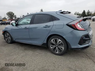 2021 Honda Civic Sport with VIN SHHFK7H4XMU422397, listed as a Copart auction lot 50767515 with 87,010 mi miles and Salvage Title. Bid and sale history available at DreamBid. Image 2.