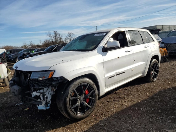 2021 Jeep Grand Cherokee SRT with VIN 1C4RJFDJ0MC548983, listed as a Copart auction lot 84048824 with 45,247 mi miles and Salvage Title. Bid and sale history available at carsss.com. Image 1.