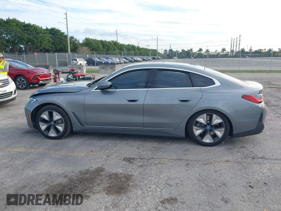 2024 BMW i4 eDrive35 z VIN WBY43AW00RFT13208, wystawiony jako IAAI lot #41191478 z przebiegiem 9 638 mil mil oraz . Historia ofert i sprzedaży dostępna na DreamBid. Obrazek 14.