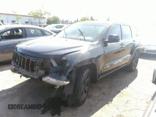2011 Jeep Grand Cherokee Laredo with VIN 1J4RR4GG4BC558193, listed as a IAAI auction lot 40055870 with 110,939 mi miles and . Bid and sale history available at DreamBid. Image 2.