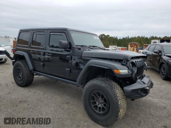 2023 Jeep Wrangler Sport with VIN 1C4HJXDG8PW643414, listed as a Copart auction lot 87768255 with 31,894 mi miles and Salvage Title. Bid and sale history available at DreamBid. Image 4.