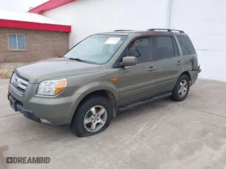 2007 Honda Pilot EX-L with VIN 2HKYF18767H538207, listed as a IAAI auction lot 41747624 with 214,026 mi miles. Bid and sale history available at carsss.com. Image 2.