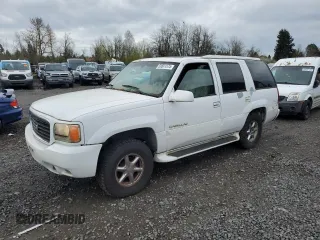 2000 Cadillac Escalade z VIN 1GYEK63R7YR193617, wystawiony jako Copart lot #50661575 z przebiegiem 270 002 mil mil oraz Czysty tytuł • Clean title. Historia ofert i sprzedaży dostępna na DreamBid. Obrazek 1.