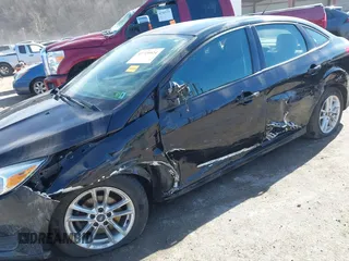 2016 Ford Focus SE with VIN 1FADP3F29GL304823, listed as a IAAI auction lot 41720924 with 82,245 mi miles. Bid and sale history available at carsss.com. Image 6.