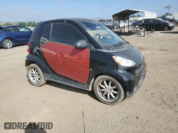 2014 Smart fortwo Pure z VIN WMEEJ3BA1EK753320, wystawiony jako Copart lot #55665555 z przebiegiem 71 305 mil mil oraz Szkody całkowita. Historia ofert i sprzedaży dostępna na DreamBid. Obrazek 4.