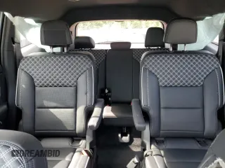 2025 GMC Acadia FWD Denali z VIN 1GKENLRS1SJ139357, wystawiony jako Copart lot #54883335 z przebiegiem 3119 mil mil oraz Szkody całkowita. Historia ofert i sprzedaży dostępna na DreamBid. Obrazek 10.