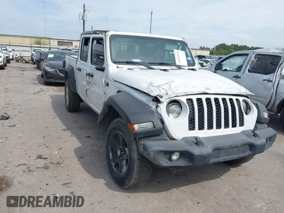 2020 Jeep Gladiator Sport S with VIN 1C6HJTAG9LL161535, listed as a IAAI auction lot 42053904 with 104,260 mi miles and . Bid and sale history available at DreamBid. Image 1.