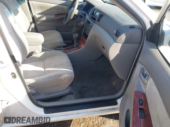 2004 Toyota Corolla CE with VIN JTDBR32E540051928, listed as a IAAI auction lot 41958483 with 299,999 mi miles. Bid and sale history available at carsss.com. Image 5.