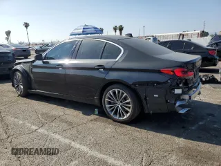2023 BMW 5 Series 530i with VIN WBA53BH05PCM01563, listed as a Copart auction lot 55525515 with 23,371 mi miles and Salvage title. Bid and sale history available at DreamBid. Image 2.