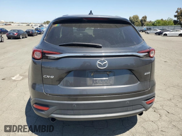 2016 Mazda CX-9 Touring z VIN JM3TCACY9G0123650, wystawiony jako Copart lot #58312625 z przebiegiem 121 408 mil mil oraz Czysty tytuł • Clean title. Historia ofert i sprzedaży dostępna na DreamBid. Obrazek 6.