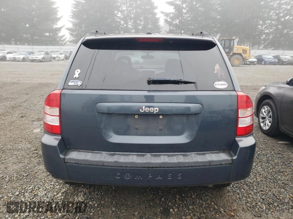 2007 Jeep Compass Sport with VIN 1J8FT470X7D261453, listed as a Copart auction lot 81710234 with 174,118 mi miles and Salvage Title. Bid and sale history available at carsss.com. Image 6.