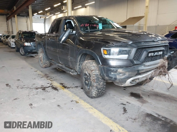 2020 Ram 1500 Rebel with VIN 1C6SRFLT0LN162491, listed as a IAAI auction lot 41841159 with 58,265 mi miles and . Bid and sale history available at DreamBid. Image 1.