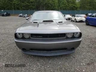 2012 Dodge Challenger SXT Plus z VIN 2C3CDYAG1CH254512, wystawiony jako Copart lot #59034895 z przebiegiem 152 597 mil mil oraz Szkoda całkowita • Salvage title. Historia ofert i sprzedaży dostępna na DreamBid. Obrazek 5.